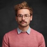 young-man-with-beard-round-glasses_273609-6967